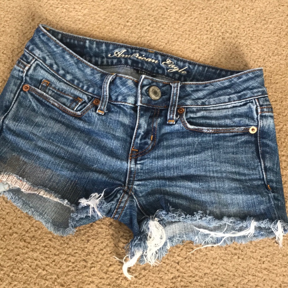 Distressed AE jean shorts